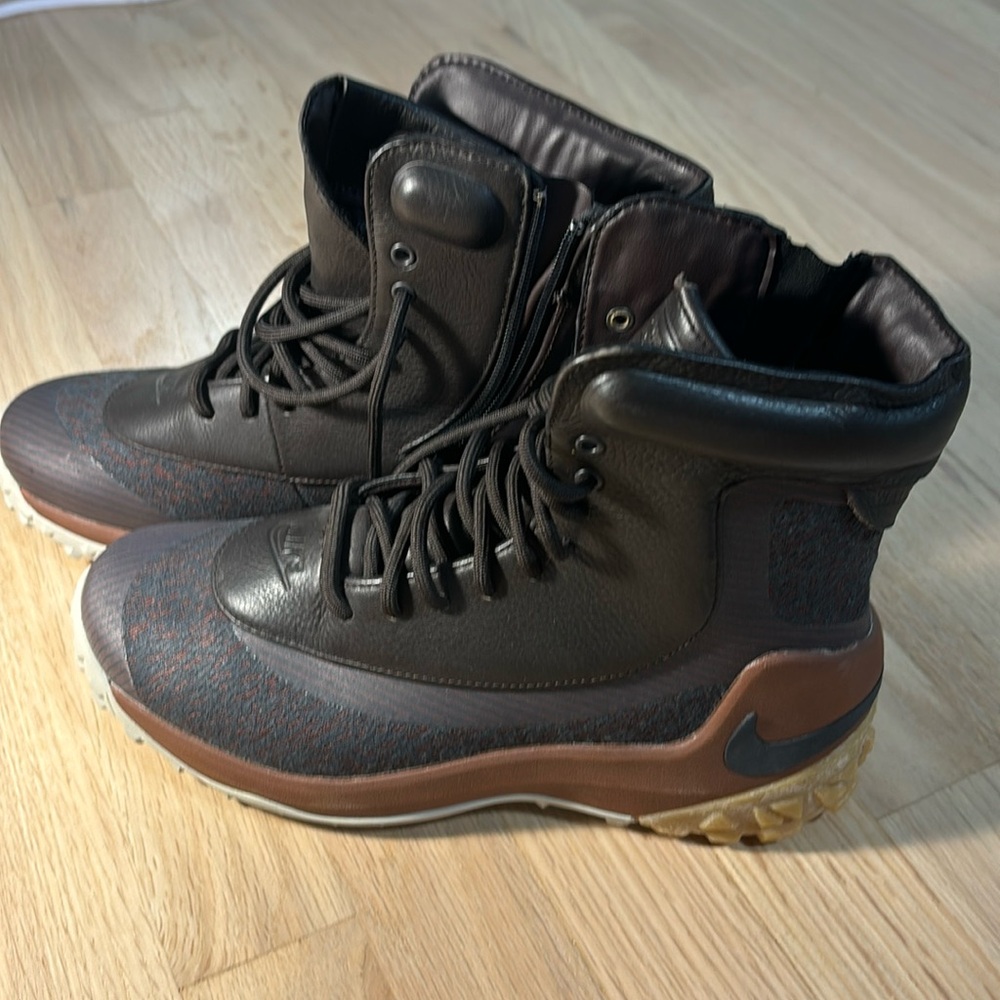 Black and brown Nike boots